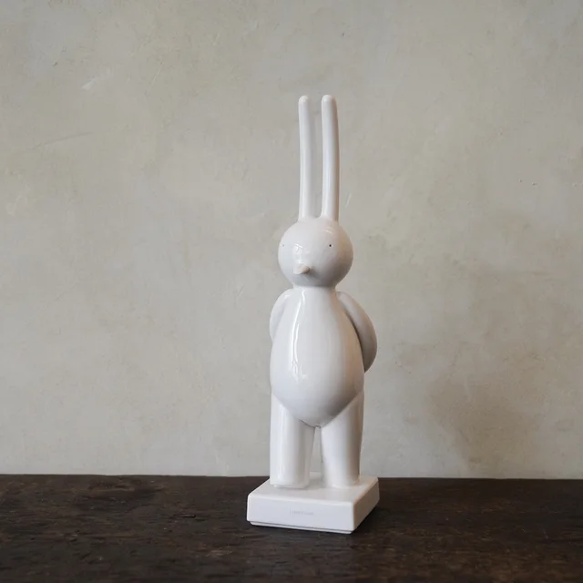 i don't care by Mr. Clement, an artist-designed object featuring characters, in black and white tones. Artwork image.
