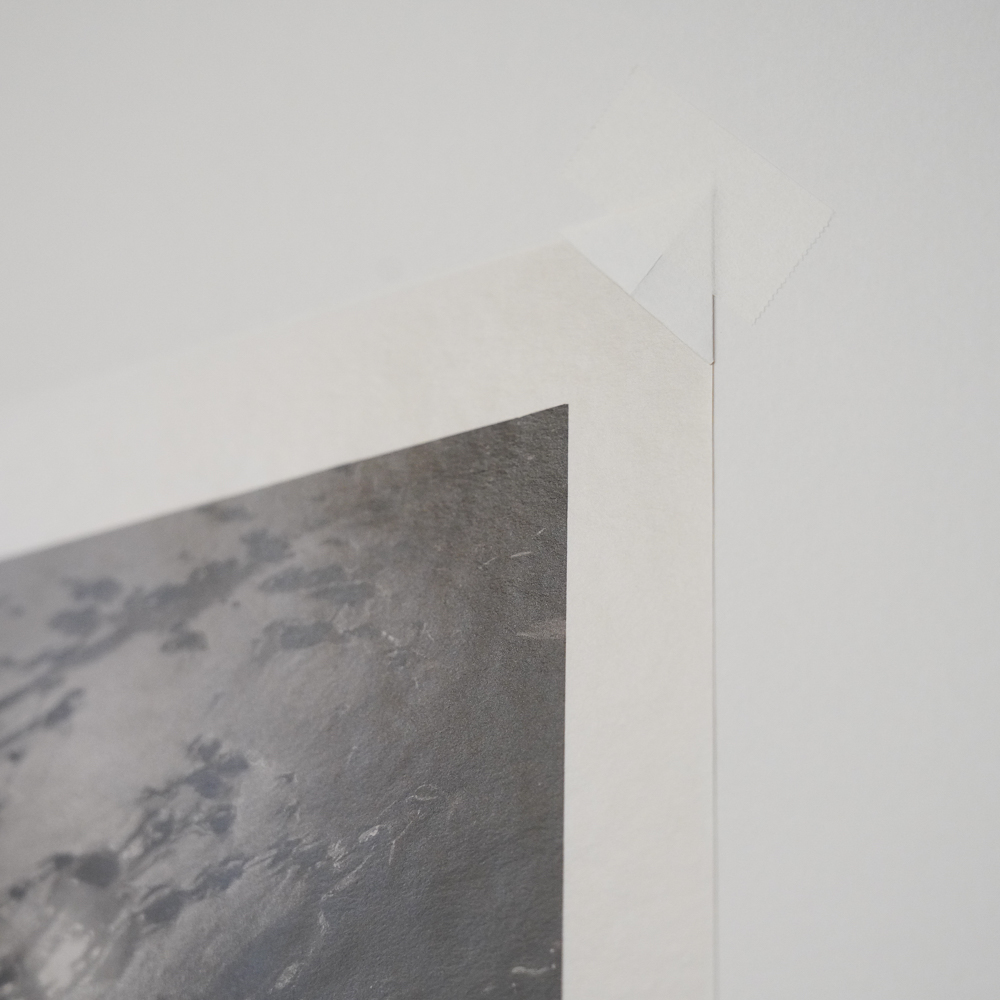 Sand and Sun #6 by Kino Koike, a vertical limited-edition artwork featuring natural landscapes and photographic and realistic imagery, in black and white and grey tones.