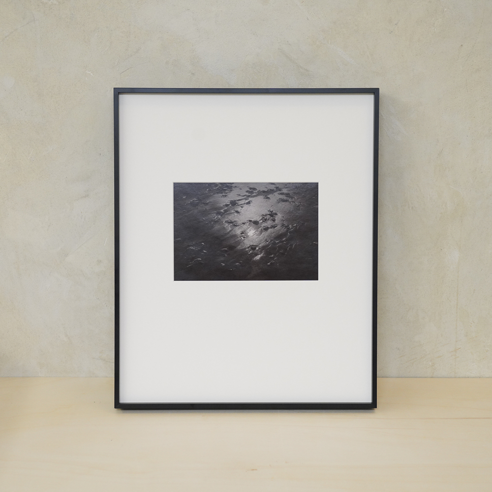 Sand and Sun #6 by Kino Koike, a vertical limited-edition artwork featuring natural landscapes and photographic and realistic imagery, in black and white and grey tones.