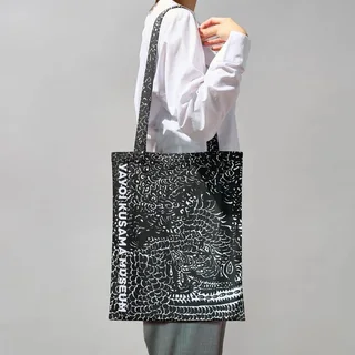 Tote Bag (Black) by Yayoi Kusama, an artist-designed object featuring abstract lines and Japanese print imagery, in black and white tones.